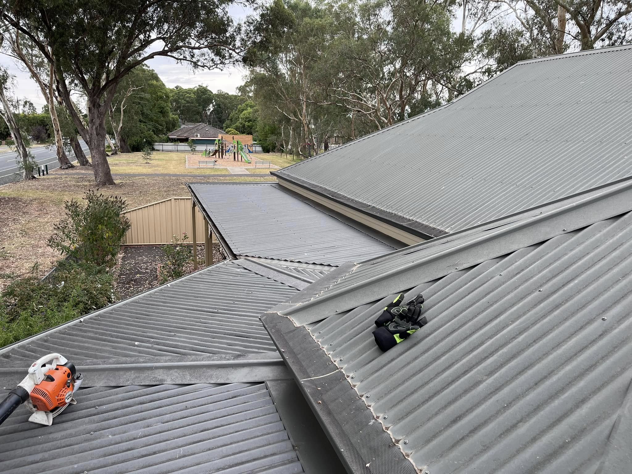 Gutter packed with debris before vacuum gutter cleaning in Marong